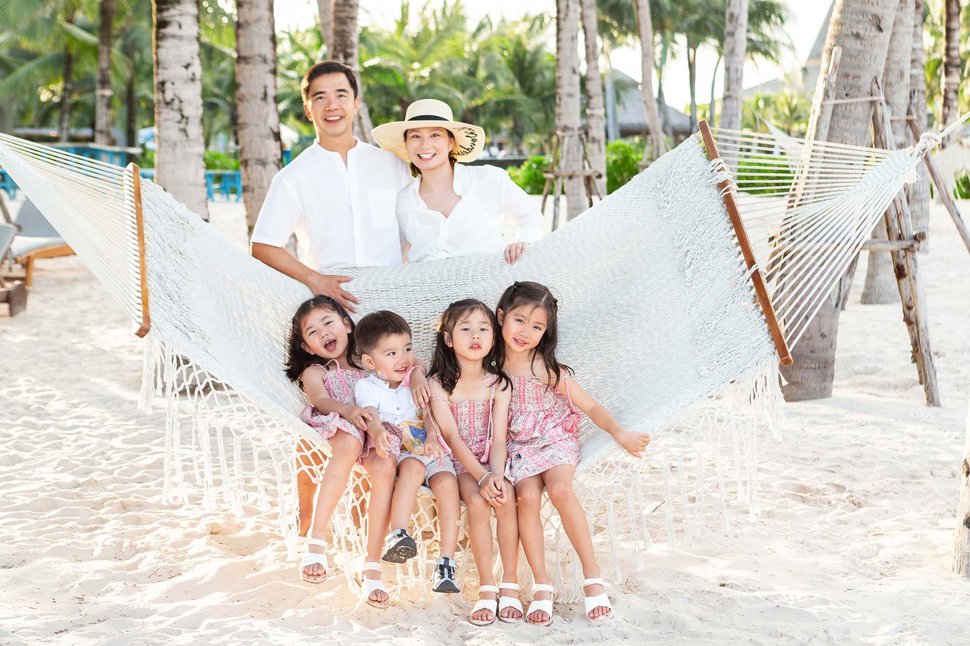 Couple walk on Khem Beach in southern Phu Quoc